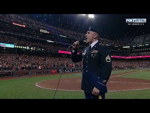 WS2014 Gm4: Staff Sgt. Aleman sings during stretch