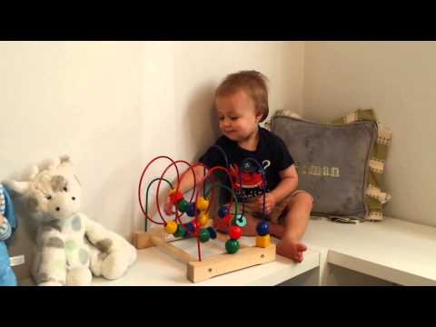 Roman playing on his shelves