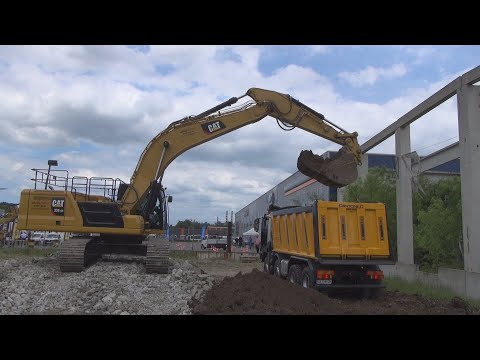 Cat Caterpillar 336 GC Excavator loading Iveco Astra HD9 84.50 Tipper Truck with soil