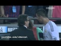 Cristiano Ronaldo talking with Carles Puyol about the penalty after the match