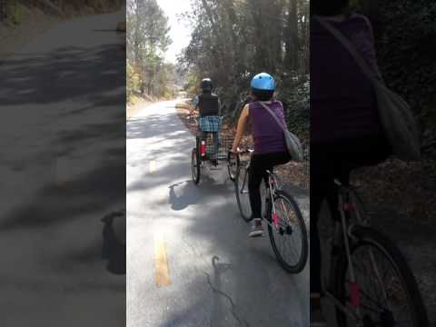 Leslie's first ride back on the bicycle (actually adult tricycle)
