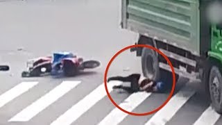Helmet saves man&#39;s life as truck runs over his head