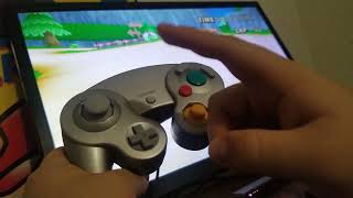 how to trick in mario kart wii with a gamecube controller
