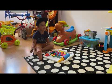 Cute kanav playing with balloons and learn colors