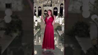 فستان أحمر ملكي بلمعة فاخرة وتصميم انسيابي