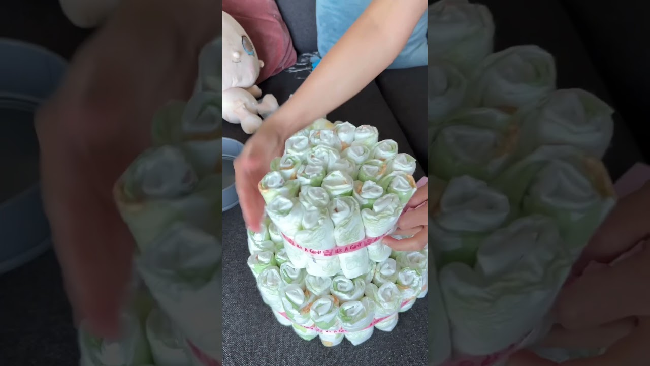 Easy diy diaper cake you can make at home for your pregnant love ones. #diy #diapercake #babyshower