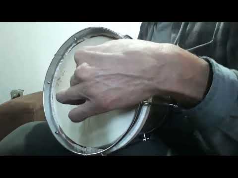 Cuíca de 8 polegadas em formato de barril.