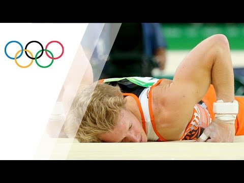 Defending champ slips from horizontal bar