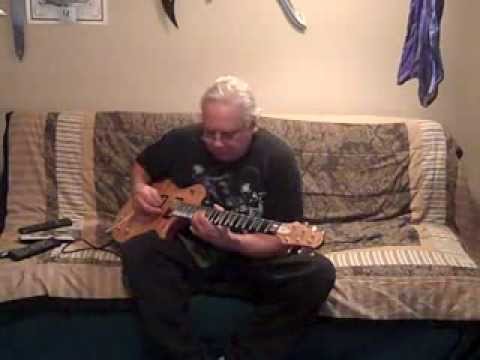 ACOUSTIC CURVES :BY ANIMUSIC PEDRO "GUITARMAN " DIAZ PLAYING GUITAR