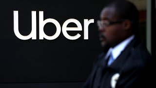 Uber reaches settlement with drivers before IPO