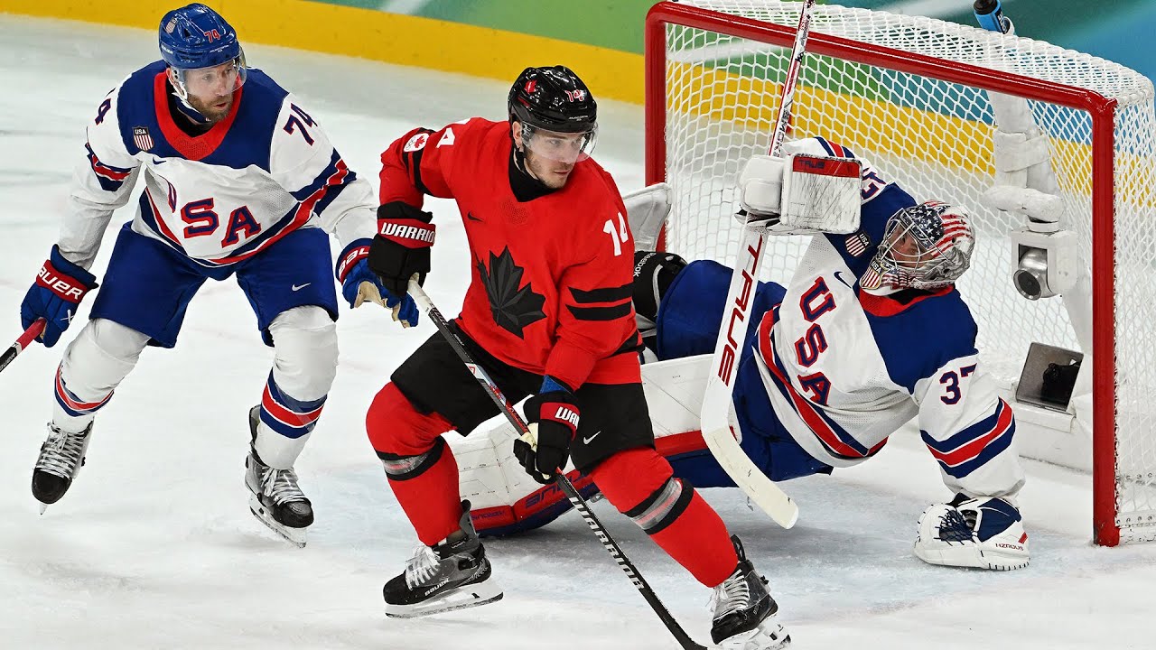 Jack Hughes celebrates his overtime game-winning goal