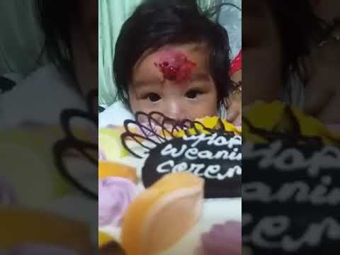 My son Randip Pratap enjoying eating cake at his weaning ceremony