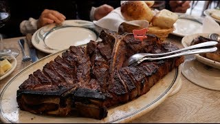 Eating the mouthwatering Rib Steak at Peter Luger Steakhouse