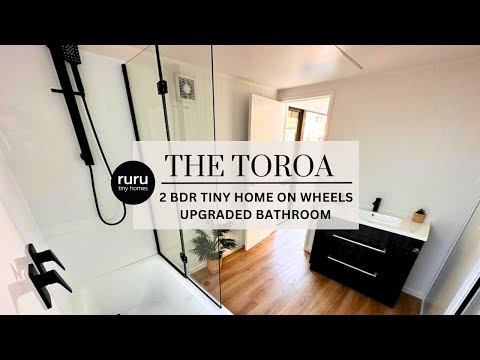 Ruru Tiny Homes: The Toroa - double storey two bedroom tiny home on wheels - U-shaped Kitchen Layout
