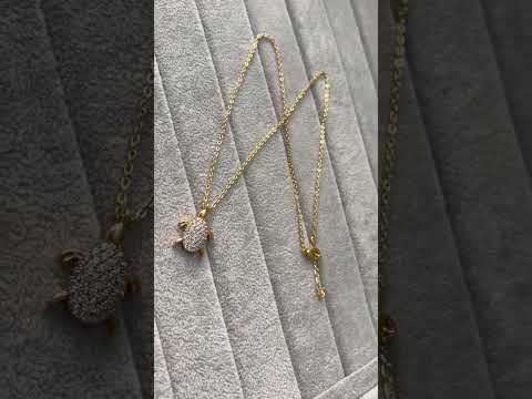 Stone studded tortoise pendant