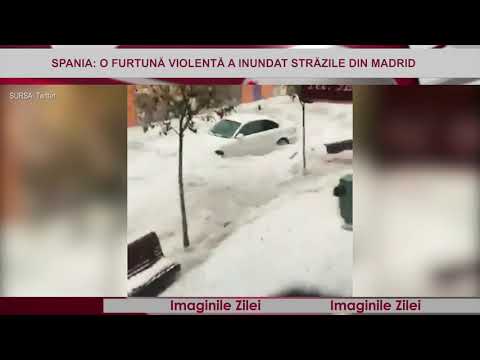 Imaginile zilei 27 August - Străzile din Madrid transformate în râuri după o ploaie abundentă