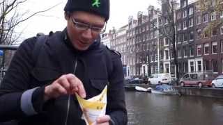 Eating Frites in Amsterdam, Netherlands on the canal.