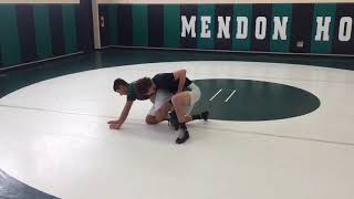 Wrestling 101: Mendon’s Nik Andaverde and Skyler Crespo demonstrate illegal stalling