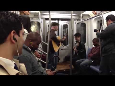 Random subway jam session turns into proposal!