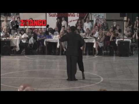  Leandro Oliver  and  Laila Rezk  are  dancing  to  the  tango  "  Gallo Ciego  "