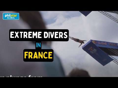 Extreme divers plunge in front of Eiffel Tower ahead of 2024 Olympic Games