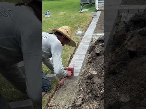 Paver edge set on concrete ✅#construction #patio #pavers #patiopavers #outdoorliving #landscaping