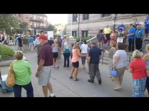 Some 400 United Teachers of Lowell teachers marching in front of City Hall for new contract
