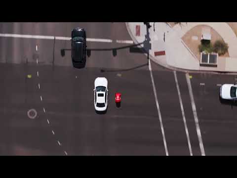 DoorDash's Dot delivery robot at an intersection