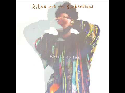 Rilan and The Bombardiers - Walking on Fire LYRICS