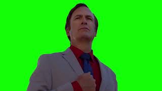 Saul Goodman / Jimmy McGill standing in front of a flag green screen