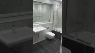 Album cover: Bathroom renovation with Polished Porcelain tiles in Wapping