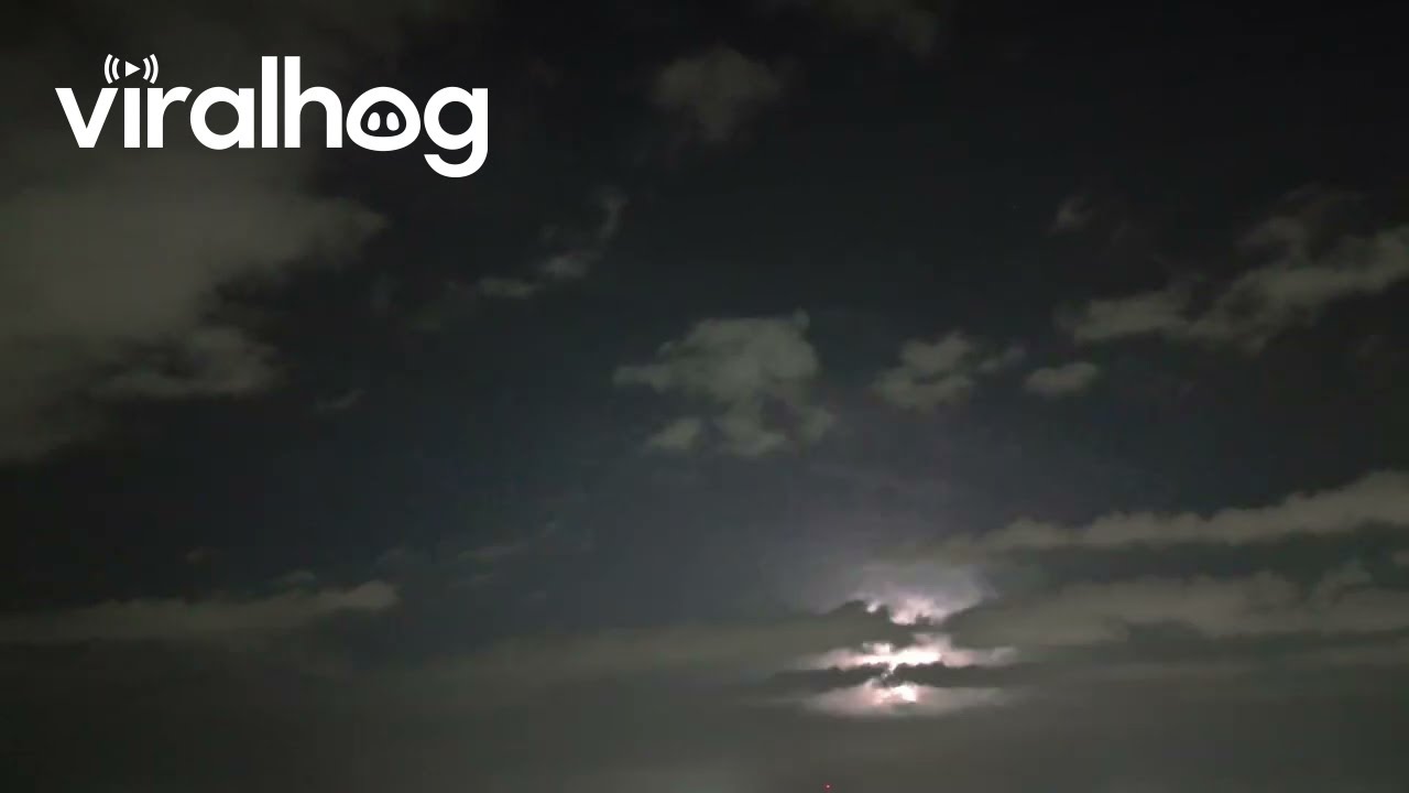 Unexplained Beam of Light Appears While Filming Thunderstorm With Drone || ViralHog