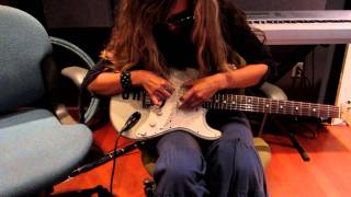 Ariah Firefly plays guitar with Gilbert Rocks