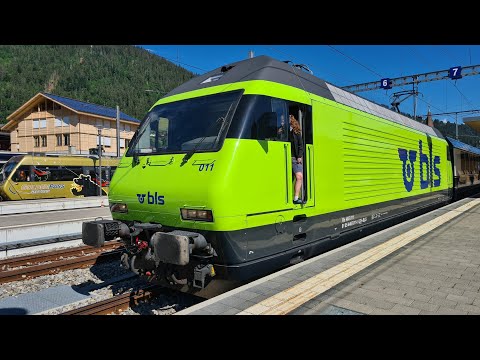 Rangierfahrt der BLS Re 465 011 mit einem MOB Goldenpass Express Interface Wagen in Zweisimmen.