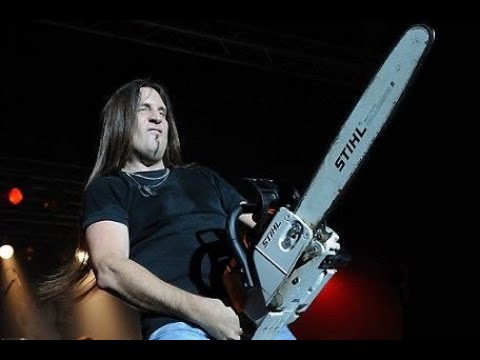 Tom Green Gets His Desk Chewed By Jesse James Dupree's Chainsaw