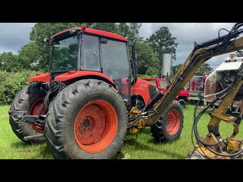 GovDeals: 2008 Kubota Tractor with Side Mower (boom axe)