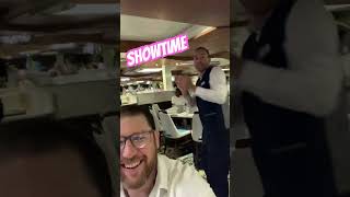 Showtime in the main dining room on the Carnival Elation