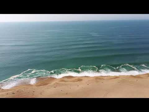 Drone flyover of Ondres Plage beach and surf