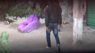 فيديو يرصد رجال أمن بالعيون يجرون الشابة الصحراوية محفوظة لفقير في الشارع بدون شفقة