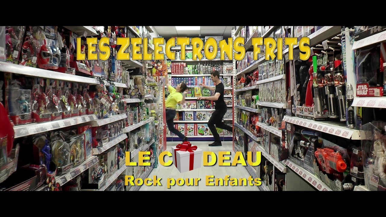 Watch video Les Zélectrons Frits - Le Cadeau (Clip Officiel) - Rock pour Enfants Les Zélectrons Frits - Le Cadeau (Clip Officiel) - Rock pour Enfants