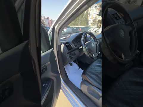 фото volkswagen touran i рестайлинг 0