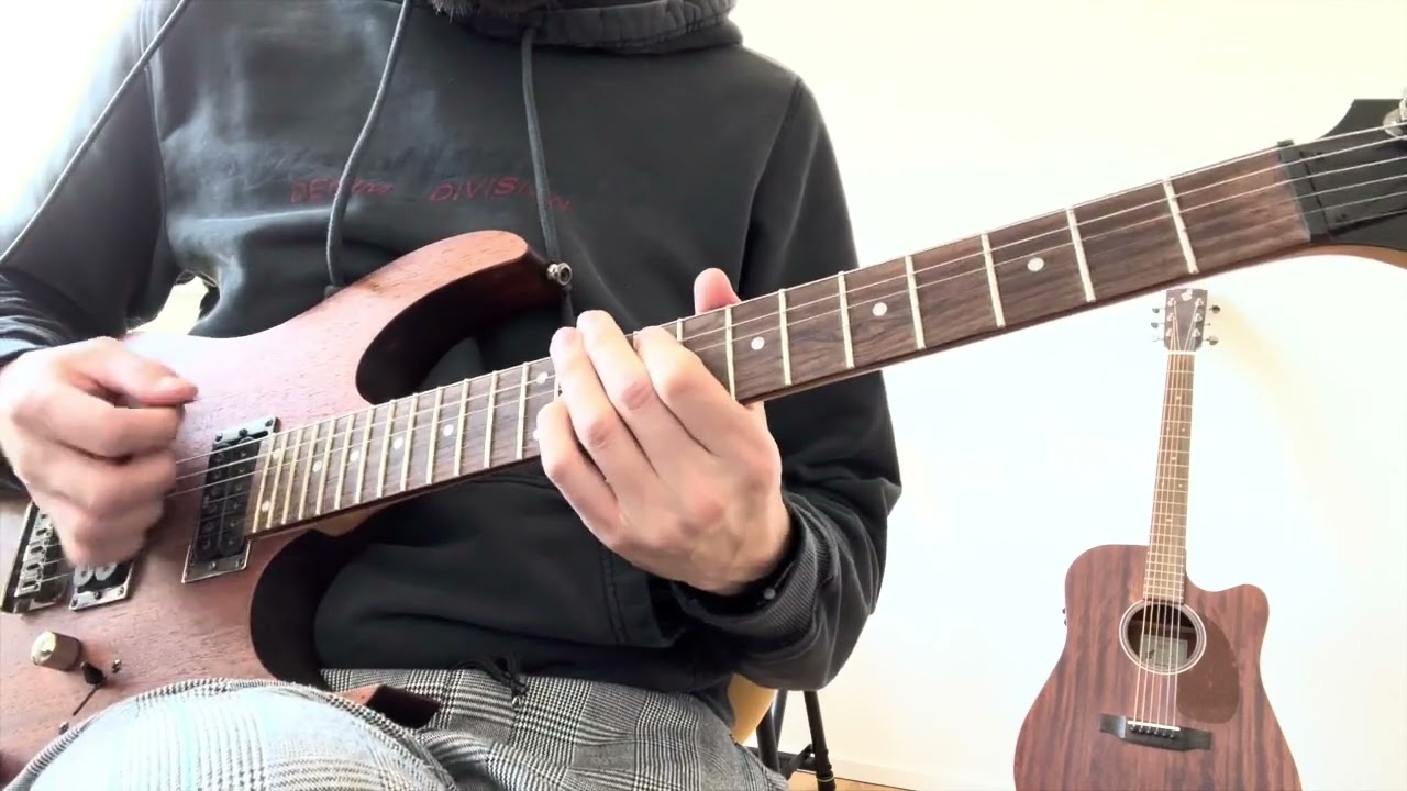 Roberto playing a clean-tone electric guitar version of Smells Like Teen Spirit in a major key