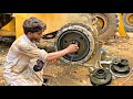 Caterpillar Wheel Loader 950E Front Wheel Seal Replacement Also Change Broken Bearings