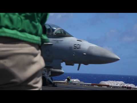 Navy aviators from USS Theodore Roosevelt eject over Philippine Sea
