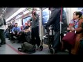 Man Playing Violin On Subway