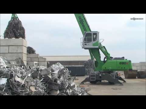 SENNEBOGEN 830 in Scrap Handling   sorting and ship loading with orange peel grab