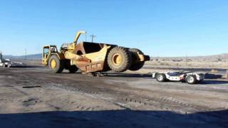 COZAD jeep & dolly CAT 651B unload
