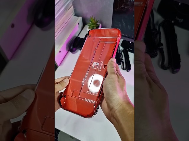 Vídeo relacionado con Nintendo Switch OLED Mario Red Edition console de jeux portables 17,8 cm (7") 64 Go Écran tactile Wifi Rouge
