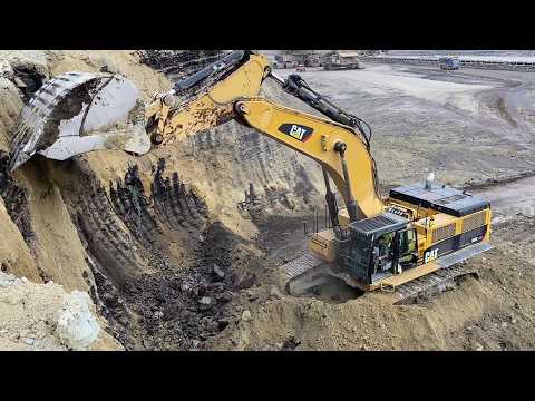 Caterpillar 385C Excavator Loading Overburden On Trucks At Busy Mining Site - Sotiriadis/Labrianidis