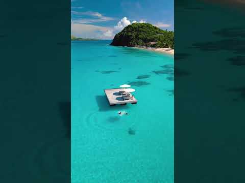 Jumping into endless blues at Kokomo Private Island💦 #island #travel #tropical